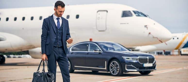 Coordinated ground transportation supporting international trade logistics and executive travel