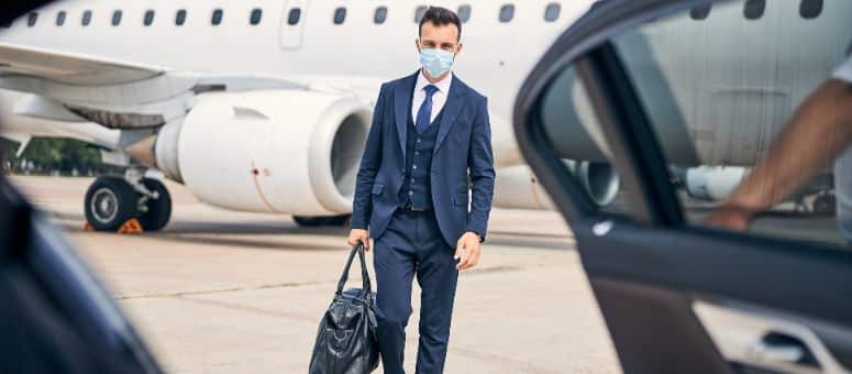 Executive arriving at airport with coordinated ground transportation support